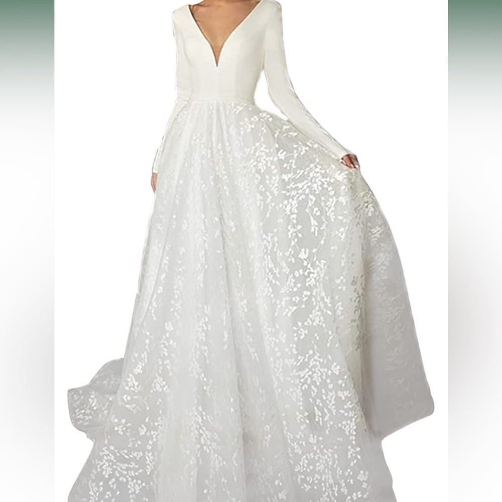 Wedding dress. Sz 10. Never worn.